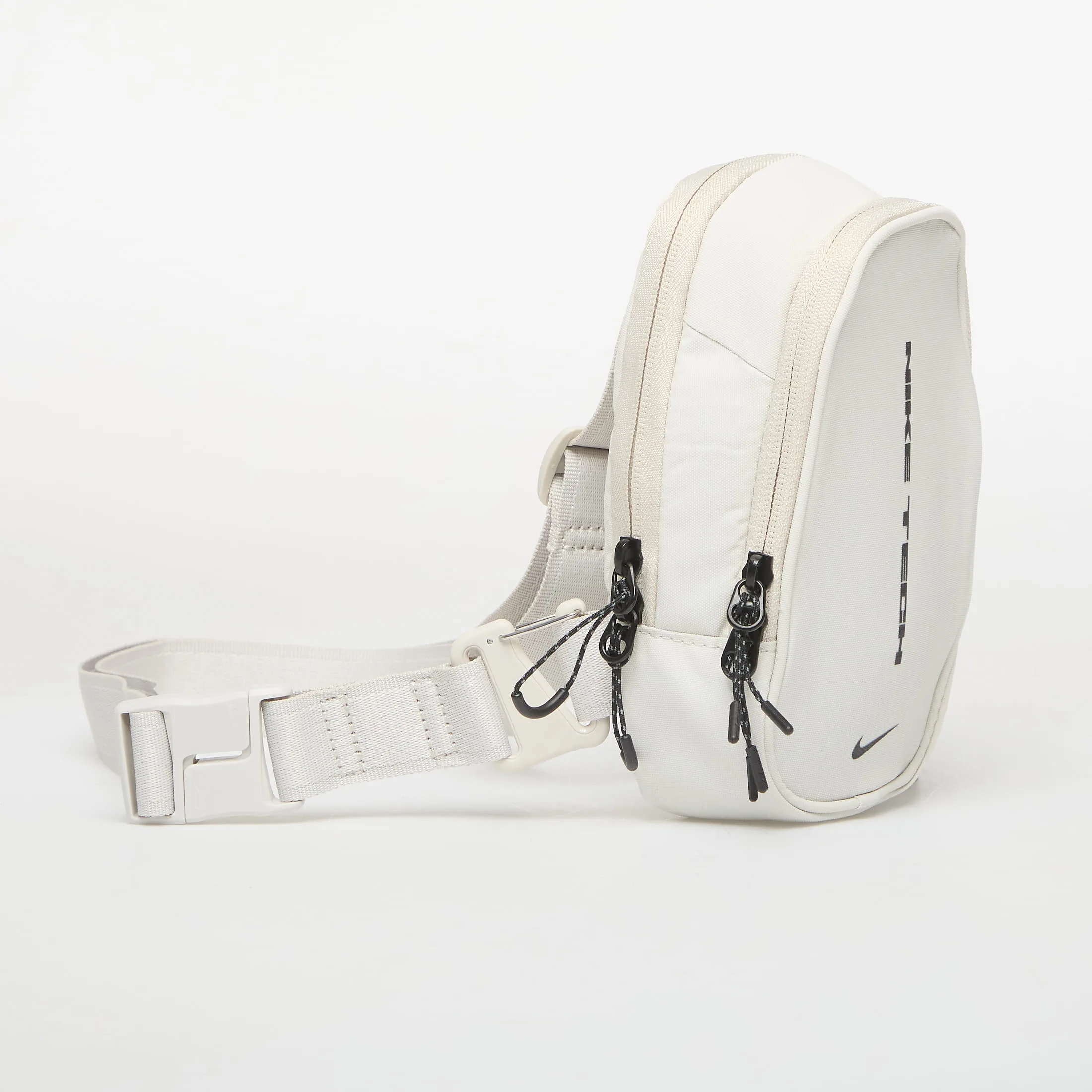 Чанта Nike Commute Nike Tech Crossbody Bag 1L Light Bone/ Light Bone/ Black 1 l – Light Bone|Black – Crossbody чанти