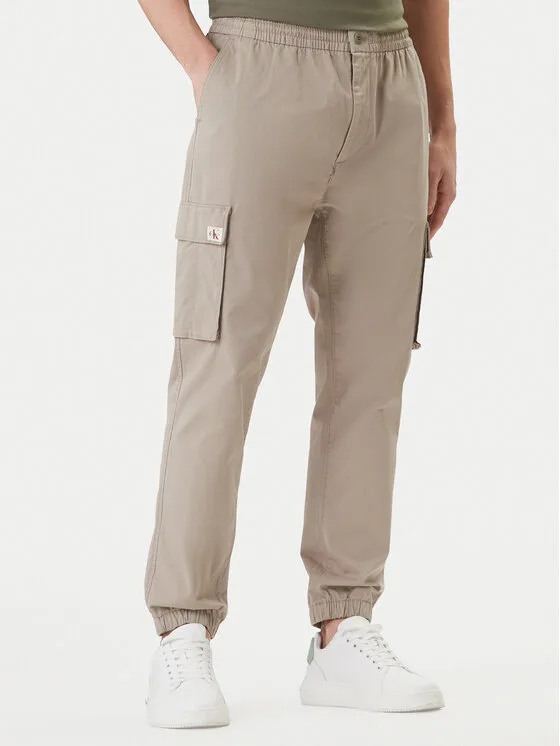 Мъжки спортен панталон Calvin Klein Jeans Comfort бежов – Мъжки спортни панталони