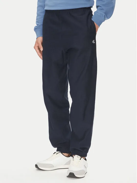 Мъжки спортен панталон Calvin Klein Jeans Premium тъмносин – Мъжки спортни панталони