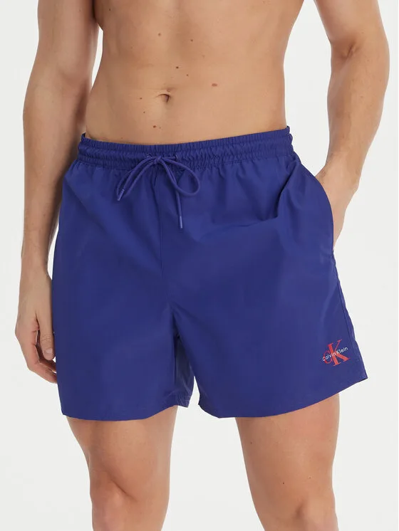 Мъжки плувни шорти Calvin Klein Swimwear виолетови – Мъжки бански
