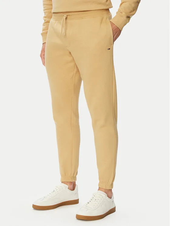Tommy Jeans Долнище анцуг Flag DM0DM20473 Бежов Slim Fit – Мъжки спортни панталони